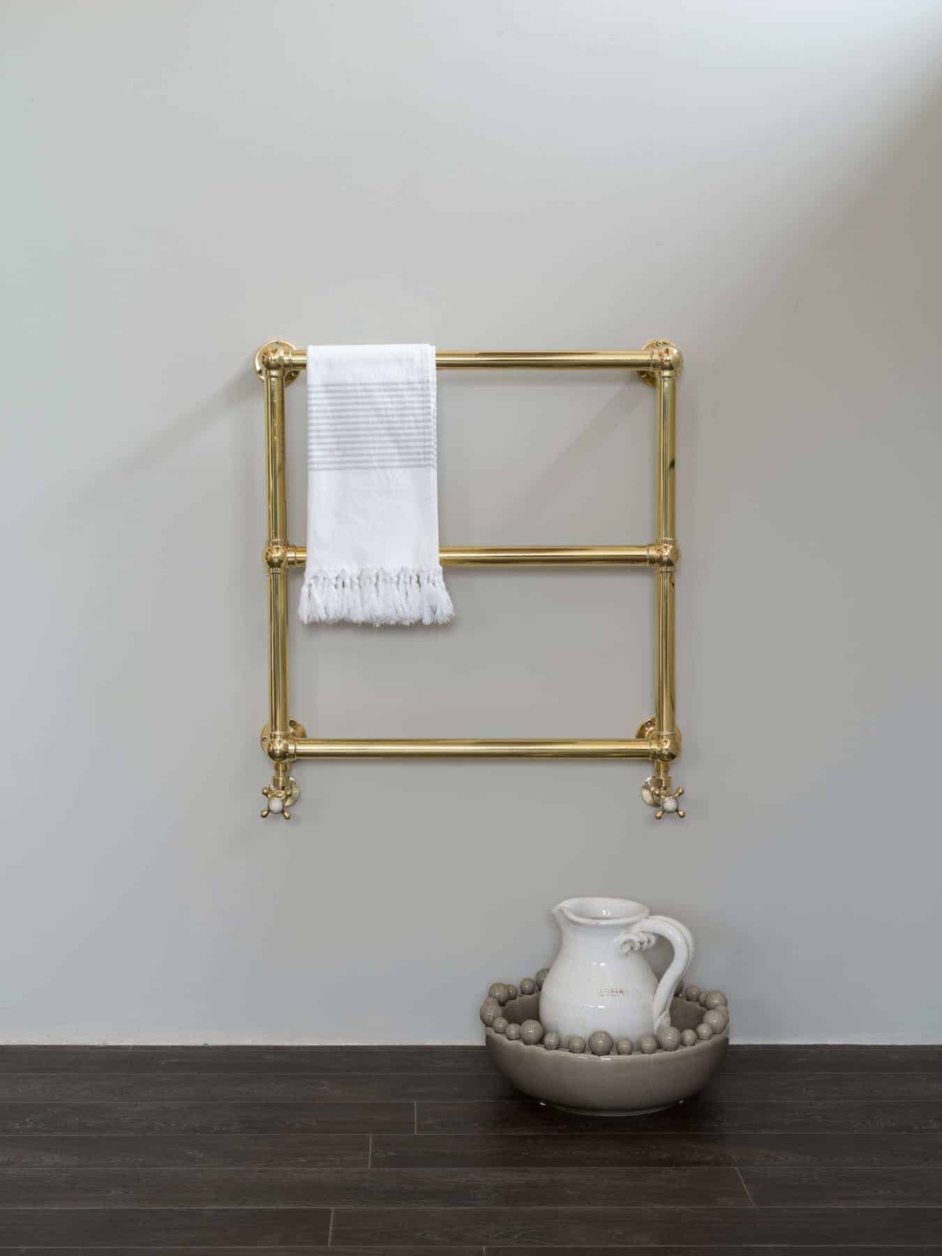 RS5850_WALL_MOUNTED_HEATED_TOWEL_RAIL_POLISHED_BRASS_FACE_ON_RICH_GOODING