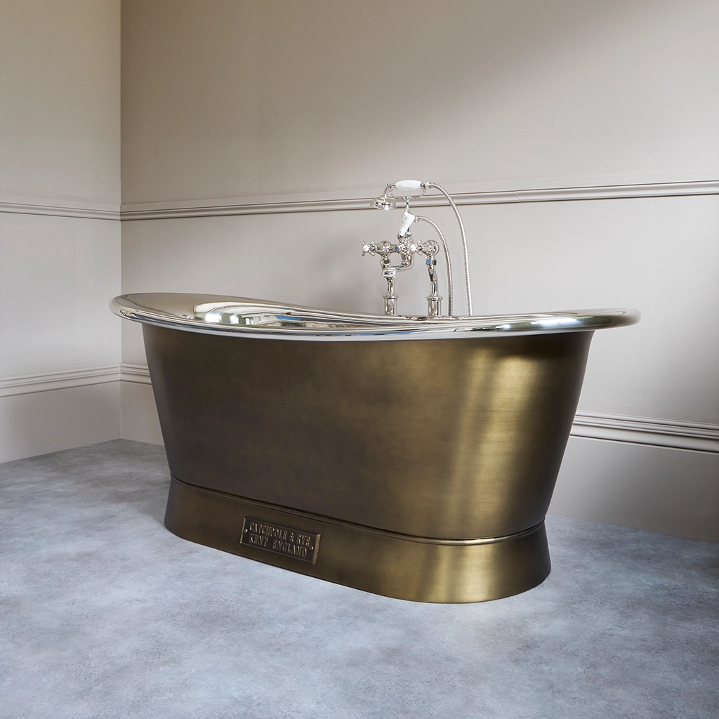 Freestanding Brass Bath Traditional roll top with bath filler on standpipes