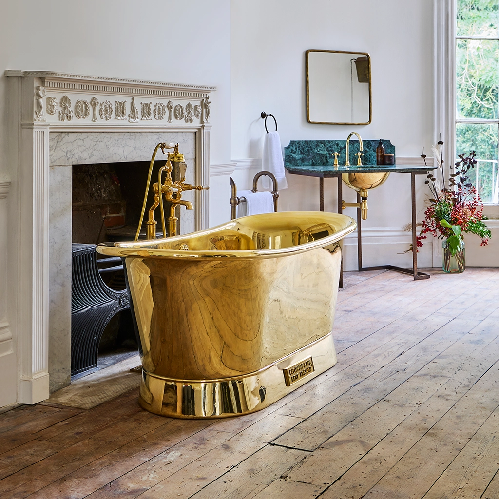 Freestanding Brass Bath Traditional roll top with bath filler on standpipes