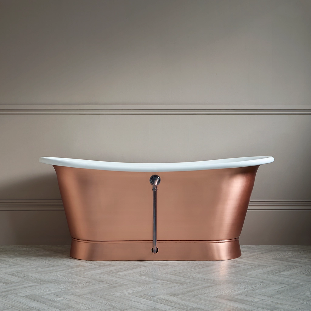 Freestanding Weathered Traditional Copper Bath with bath filler on standpipes