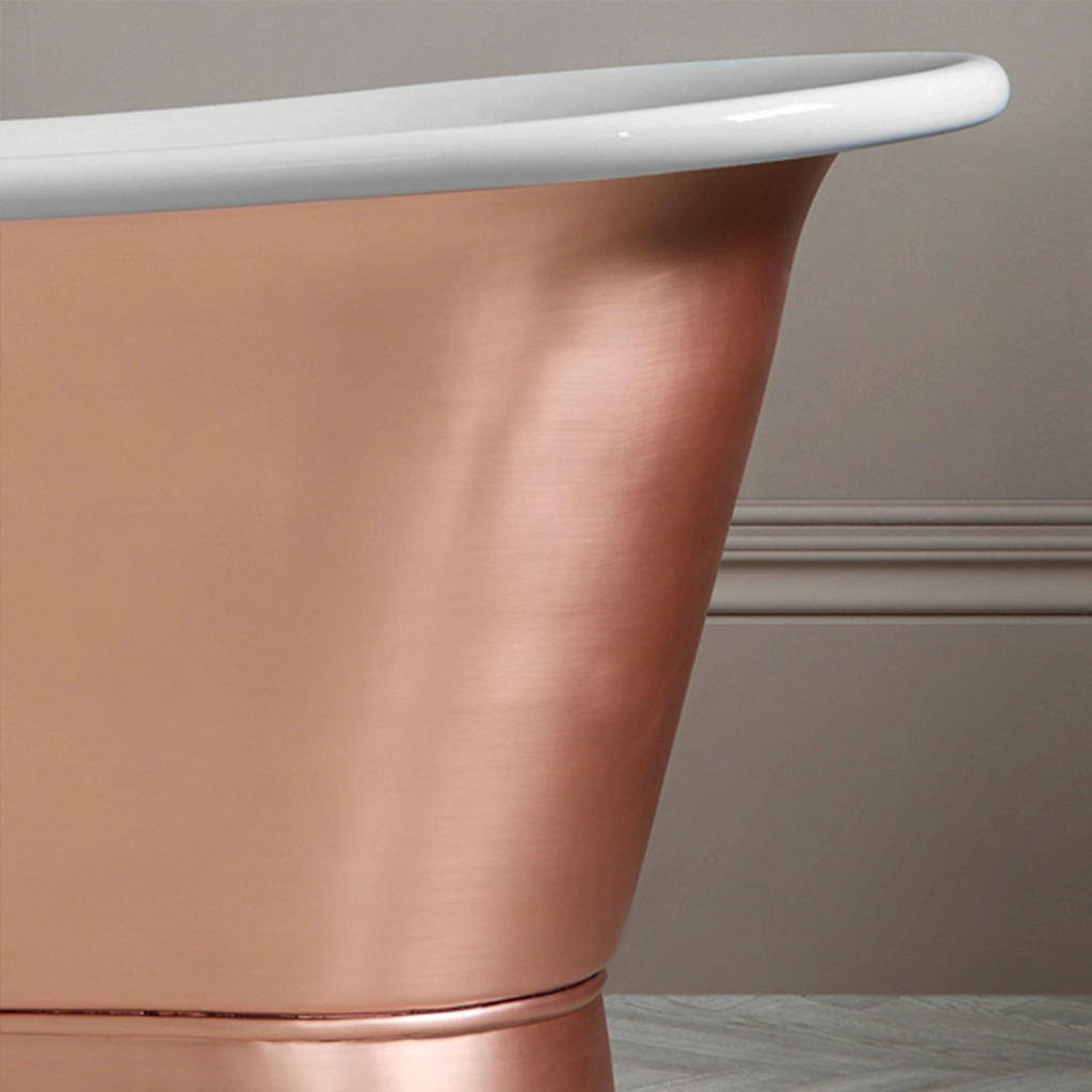 Freestanding Weathered Traditional Copper Bath with bath filler on standpipes