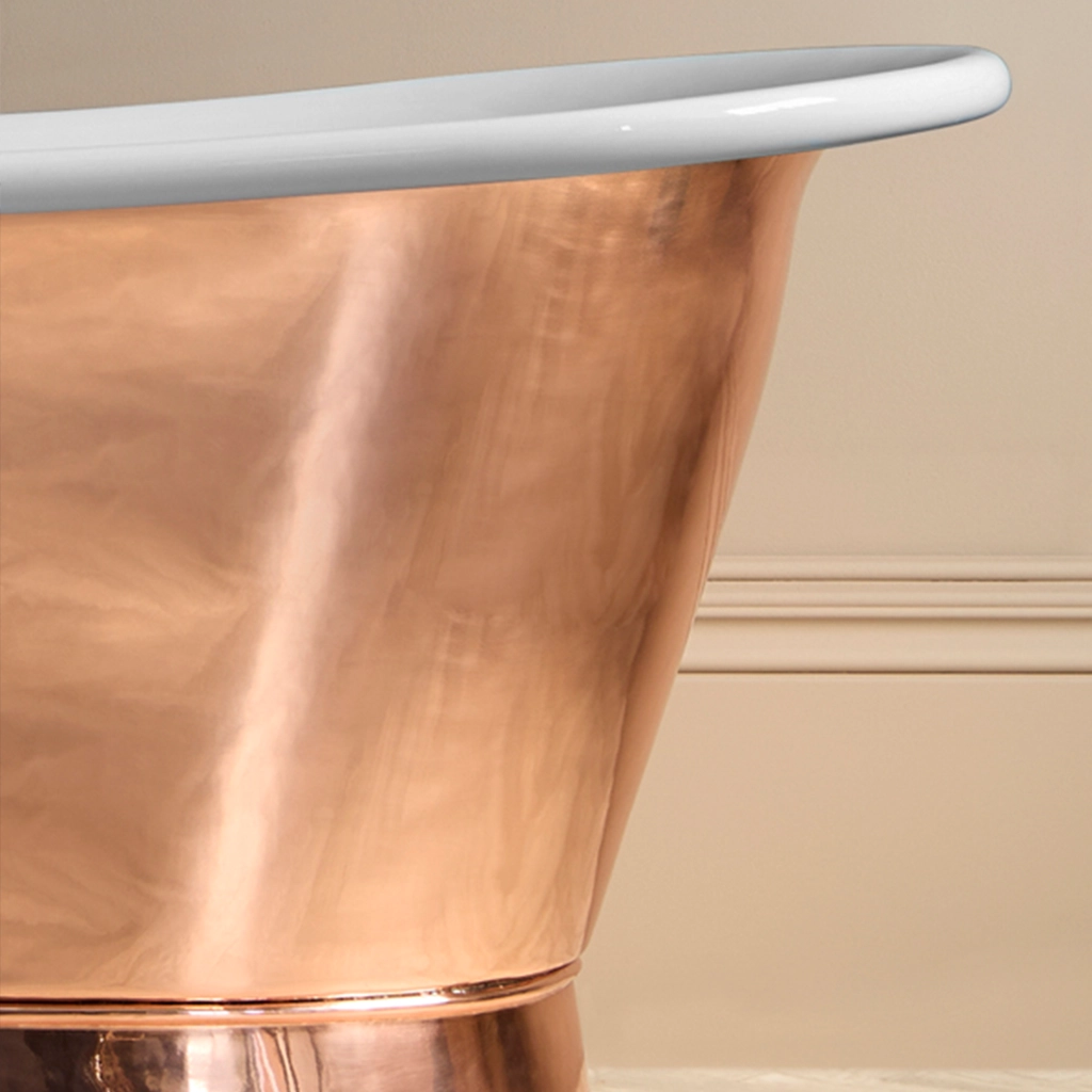 Freestanding Weathered Traditional Copper Bath with bath filler on standpipes