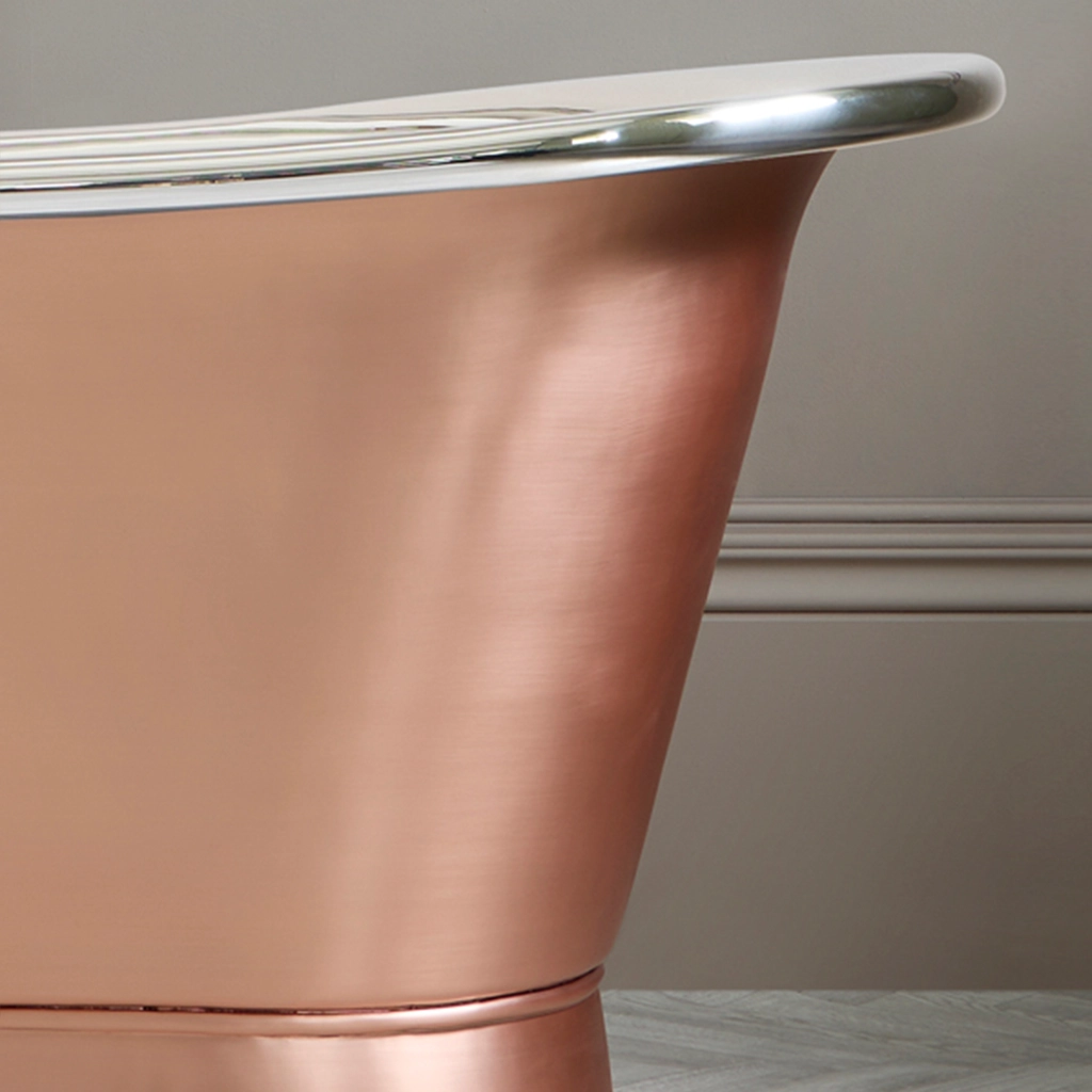 Freestanding Weathered Traditional Copper Bath with bath filler on standpipes