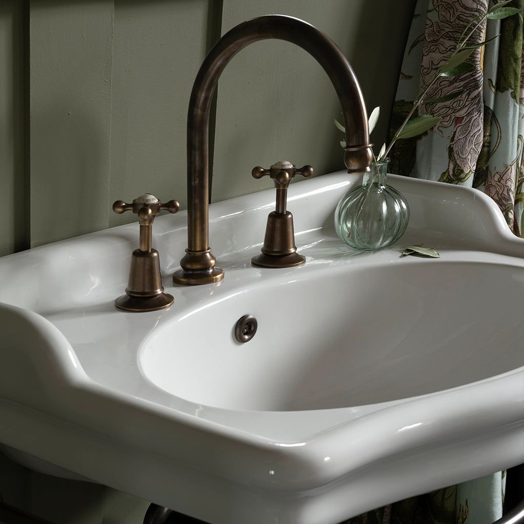 Ceramic freestanding basin available in a number of brassware finishes