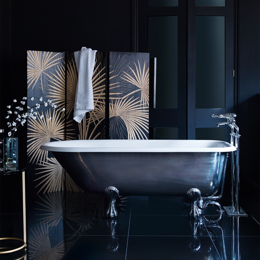 Traditional Roll top bath on feet freestanding with taps
