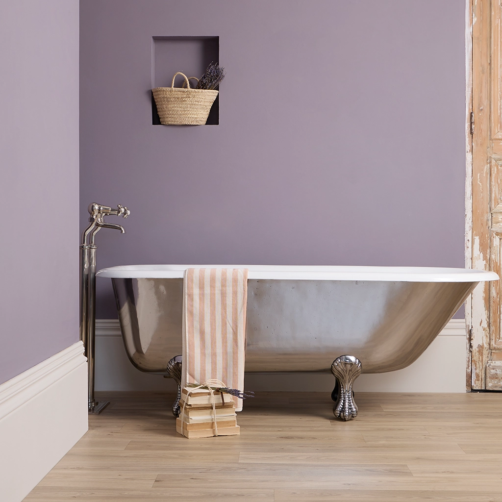 Traditional Roll top bath on feet freestanding with taps