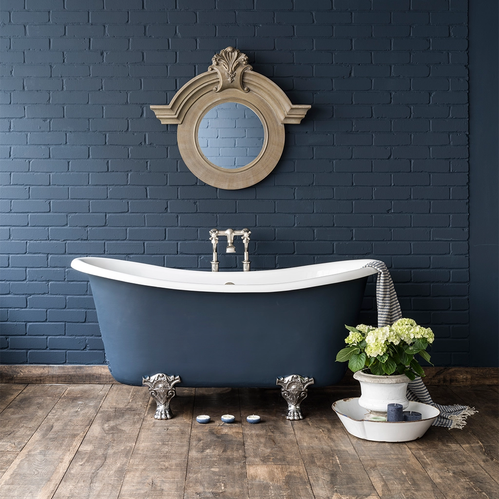 Traditional Roll top bath on feet freestanding with taps