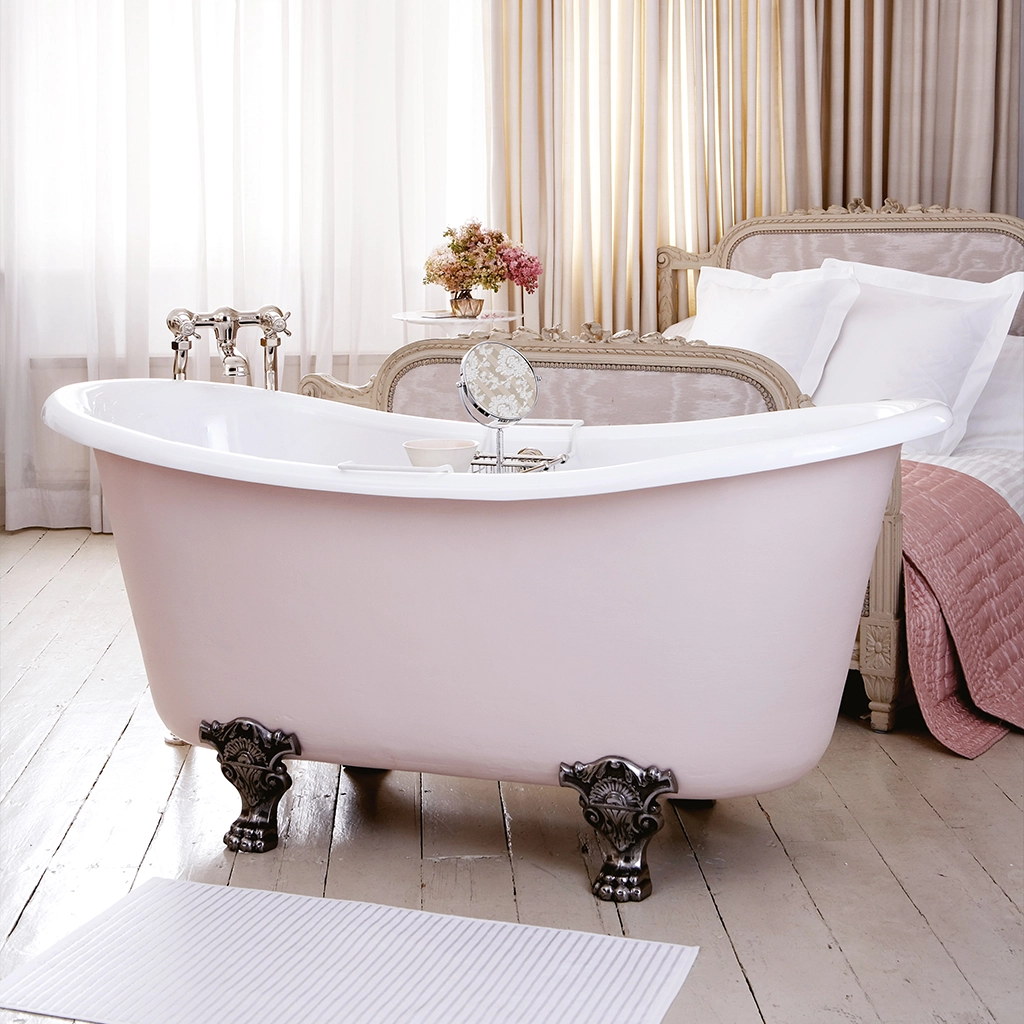 Traditional Roll top bath on feet freestanding with taps