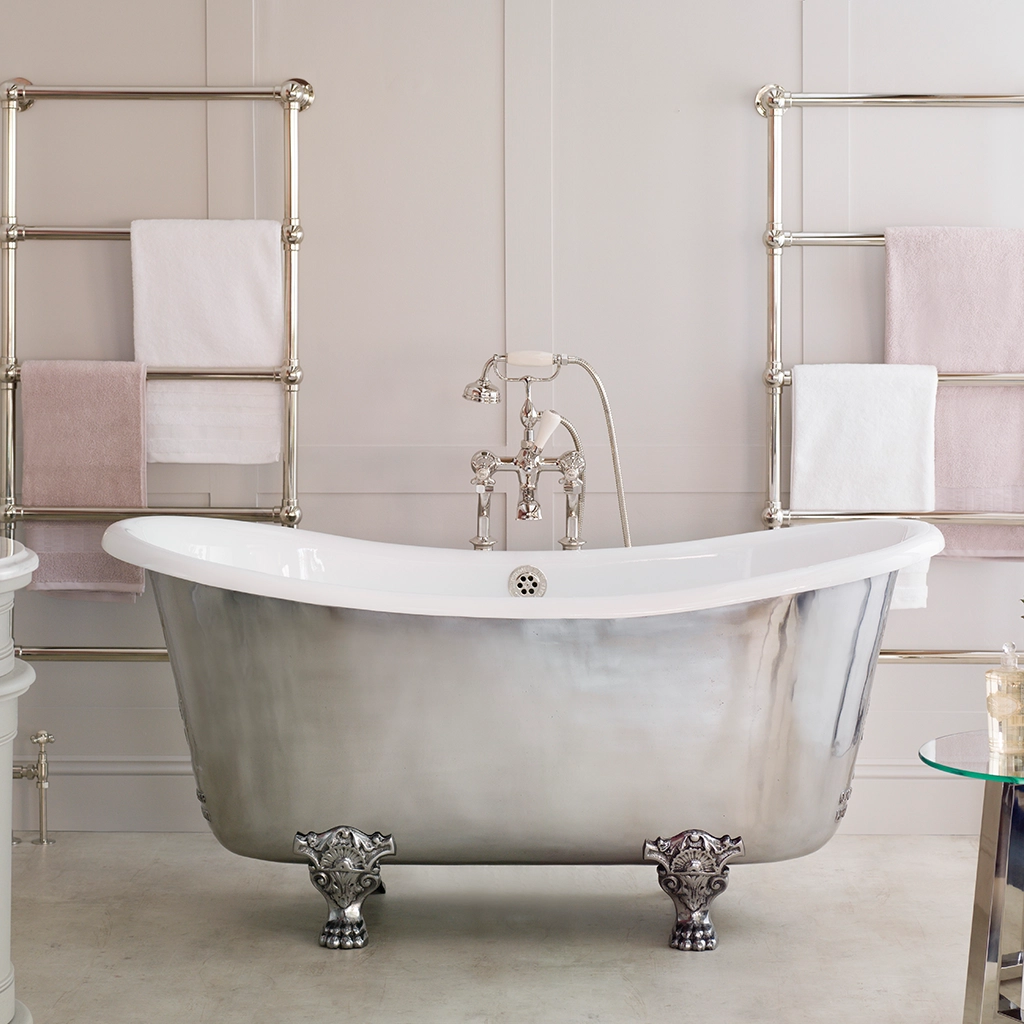 Traditional Roll top bath on feet freestanding with taps