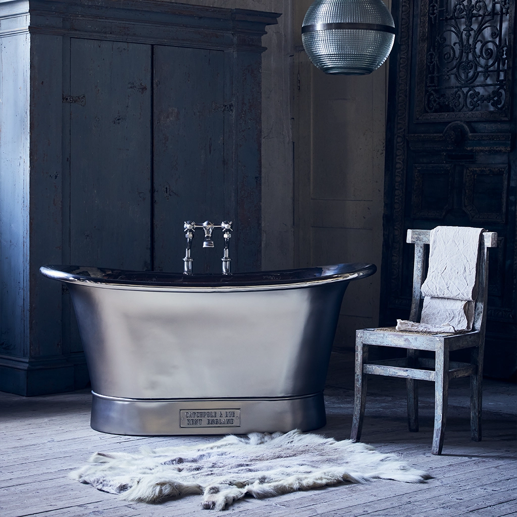 Freestanding Nickel Bath Traditional roll top with bath filler on standpipes