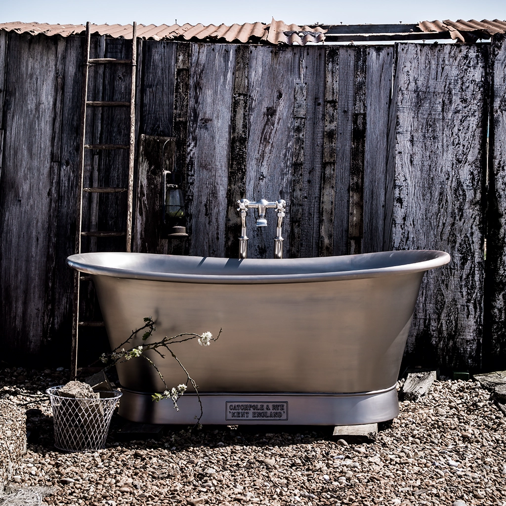 Freestanding Nickel Bath Traditional roll top with bath filler on standpipes
