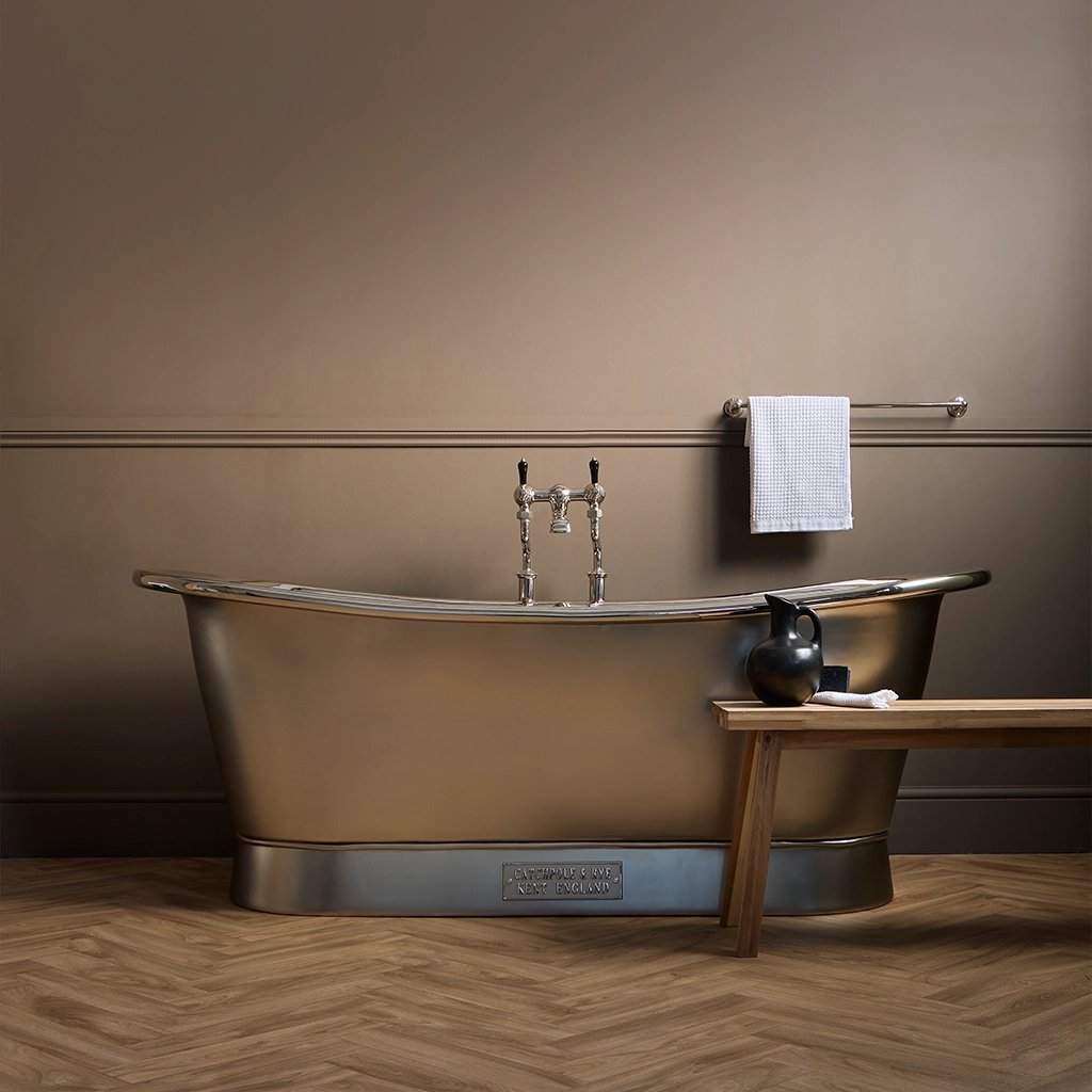Freestanding Nickel Bath Traditional roll top with bath filler on standpipes