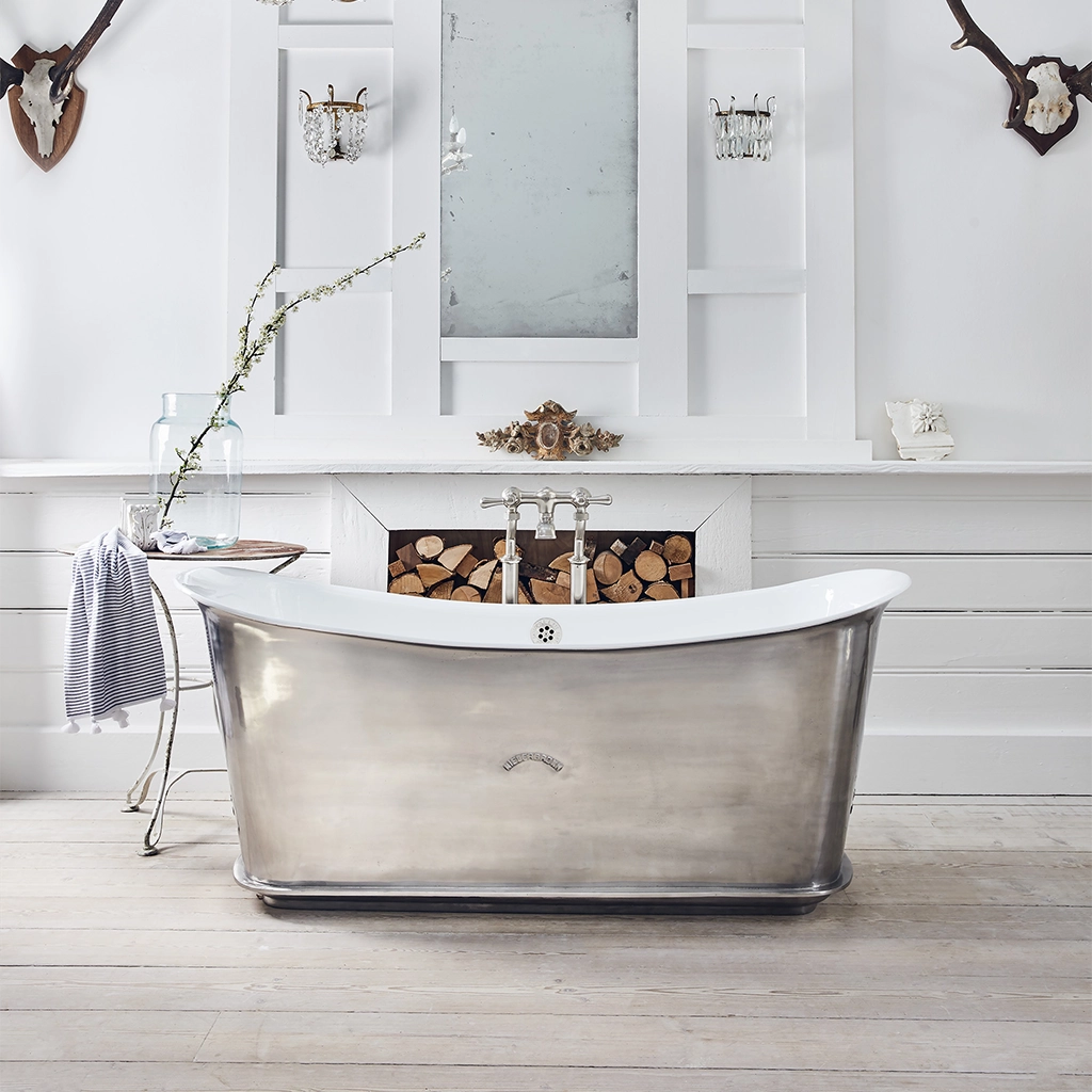 Freestanding Traditional Cast Iron Bathtub with bath filler on standpipes