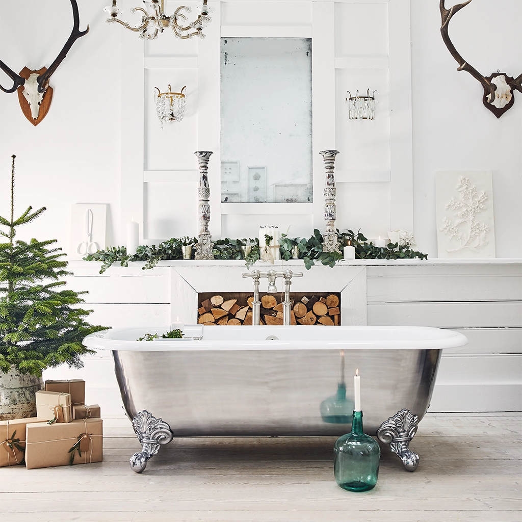 Traditional Roll top bath on feet freestanding with taps