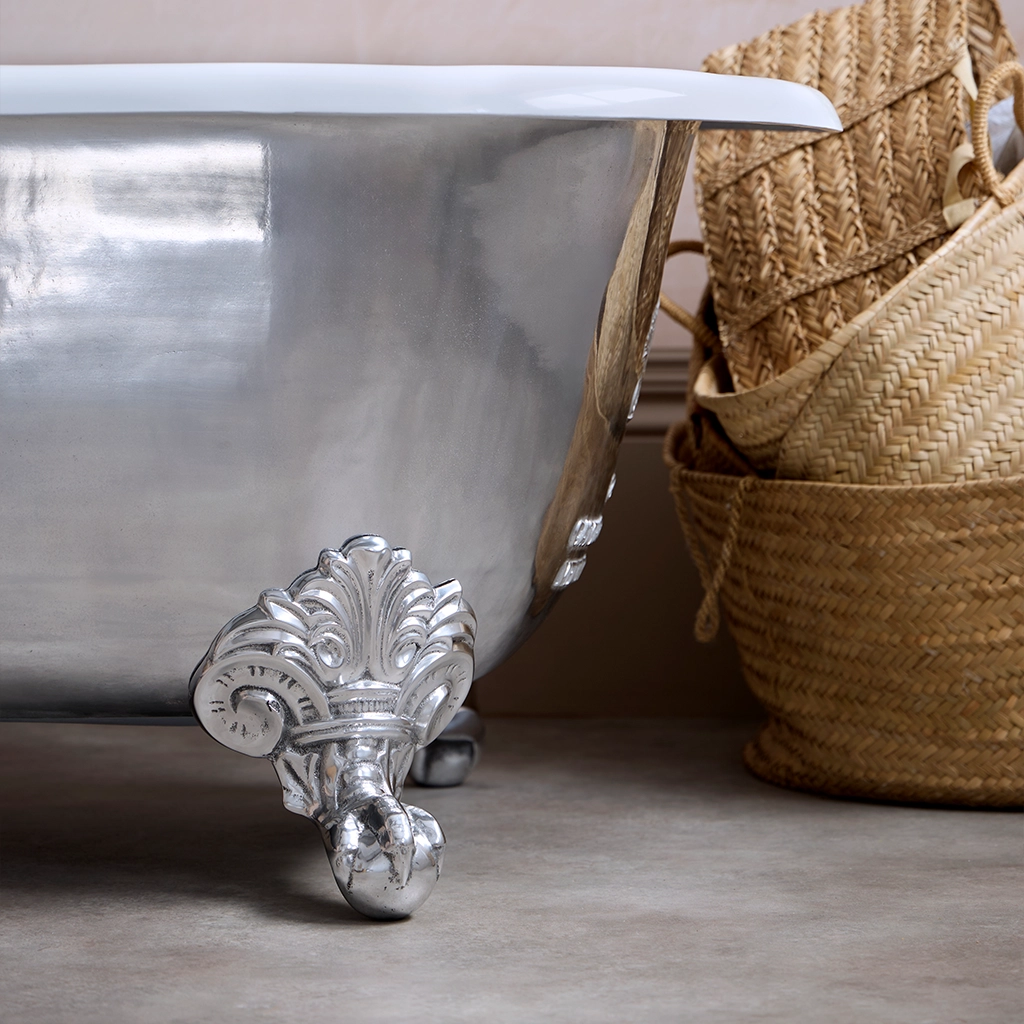 Traditional Roll top bath on feet freestanding with taps