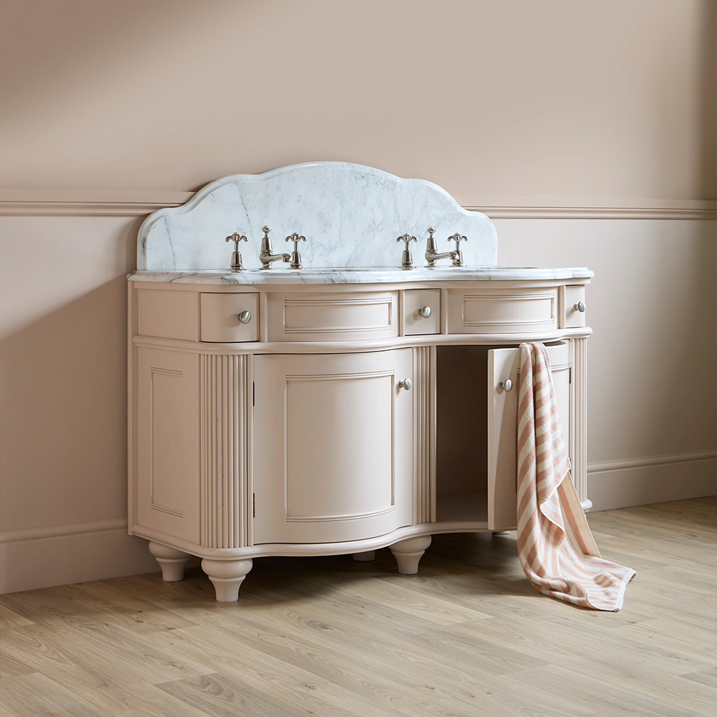 Double wooden vanity unit with amble bathroom storage and marble splashback