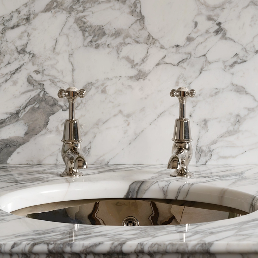 Handcrafted from the highest quality solid brass, our Basin Pillar Taps are a sleek addition to our collection. Perfectly symmetrical, chic in design and high-performing in functionality