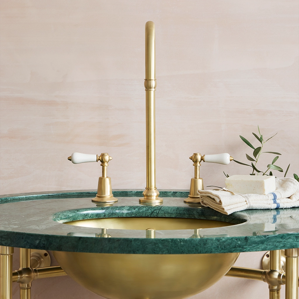 A tall deck mounted swan-neck tap made from solid brass with countless finish and tap head options.
