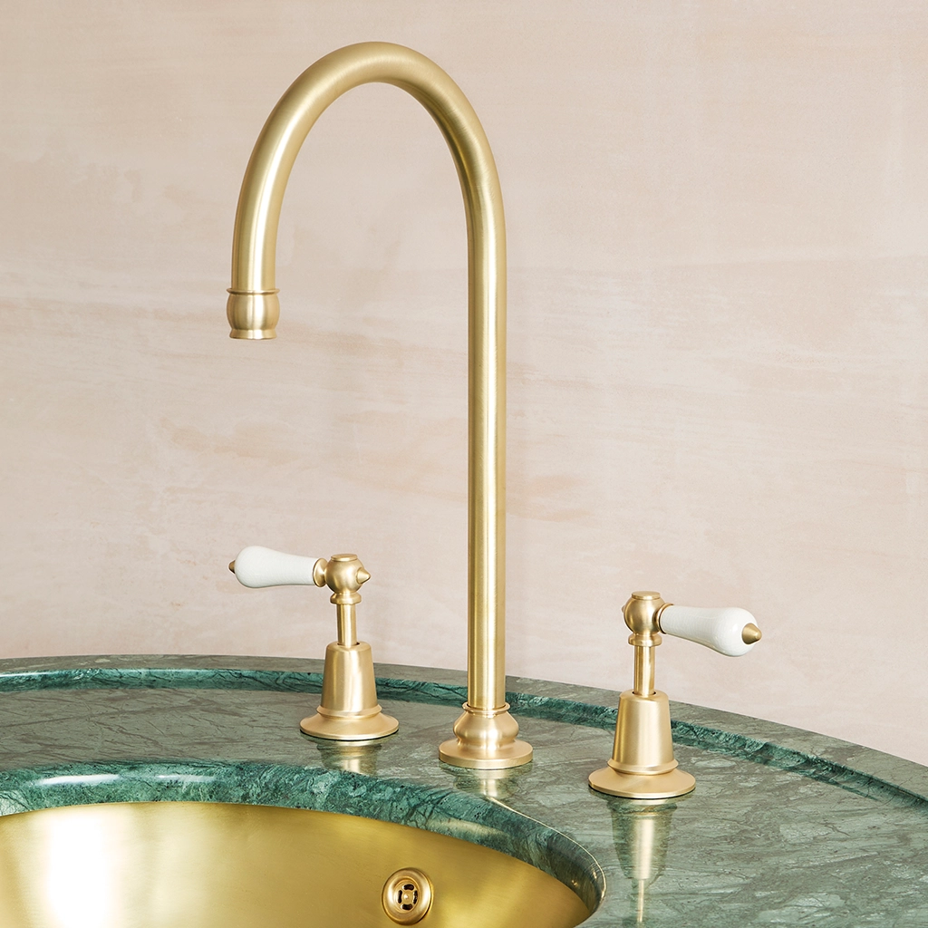 A tall deck mounted swan-neck tap made from solid brass with countless finish and tap head options.