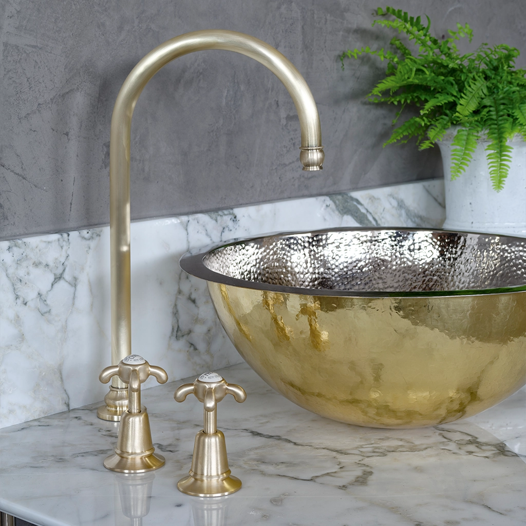 A tall deck mounted swan-neck tap made from solid brass with countless finish and tap head options.