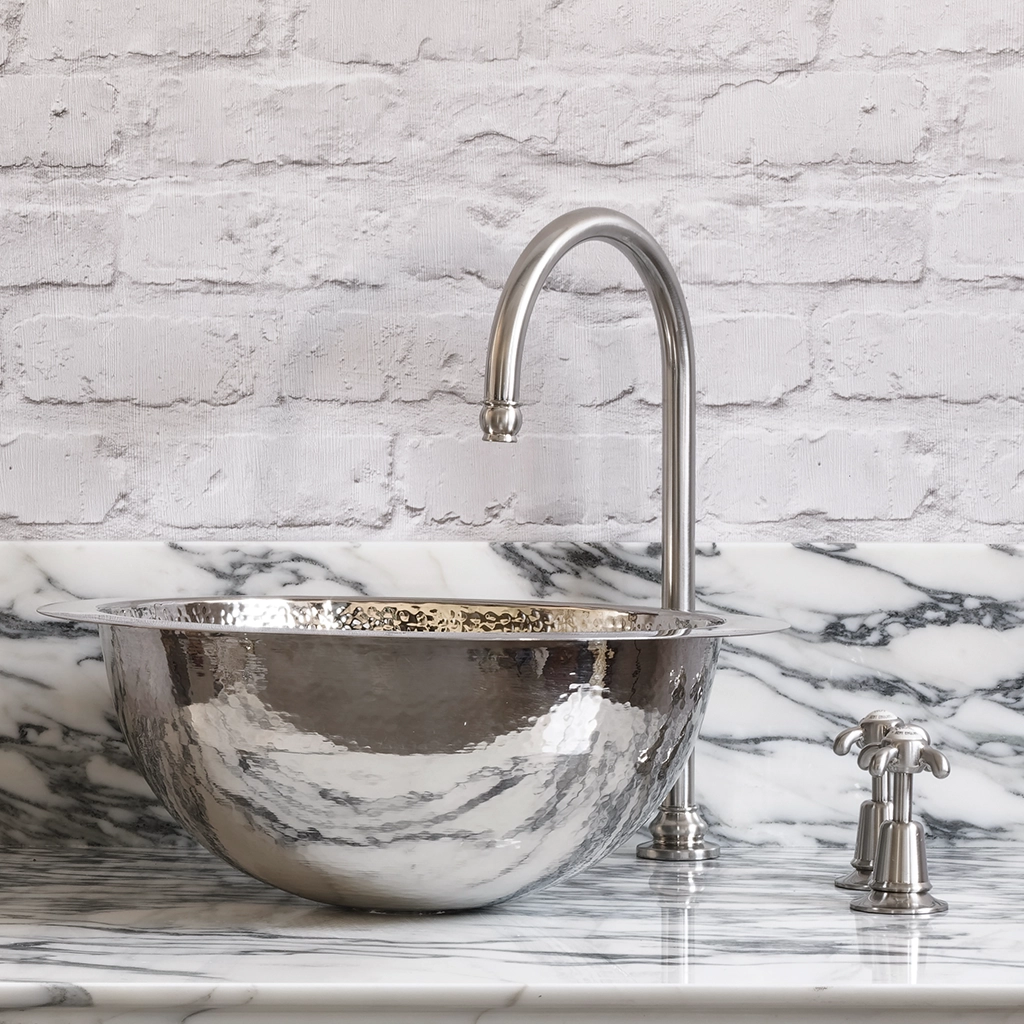 A tall deck mounted swan-neck tap made from solid brass with countless finish and tap head options.