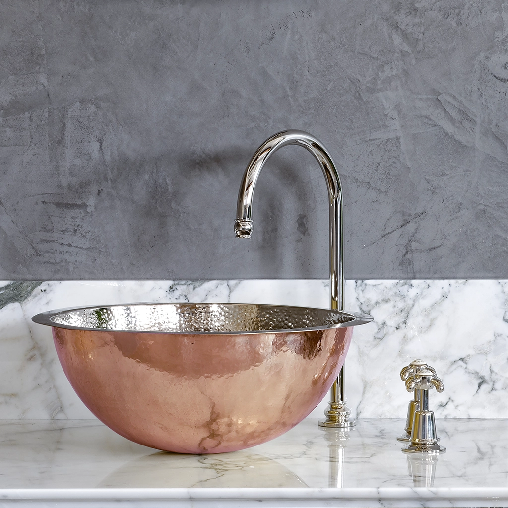 A tall deck mounted swan-neck tap made from solid brass with countless finish and tap head options.