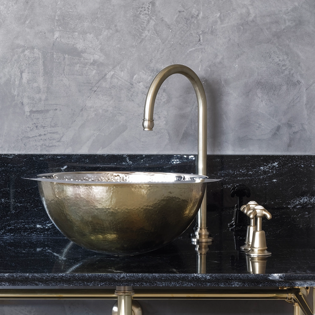 A tall deck mounted swan-neck tap made from solid brass with countless finish and tap head options.