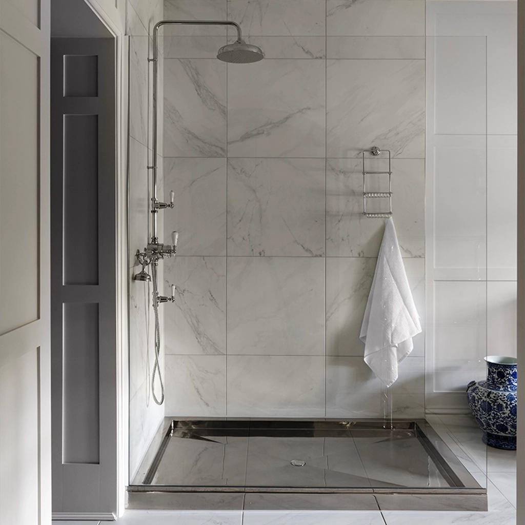 Luxury freestanding shower tray available in copper, brass and nickel