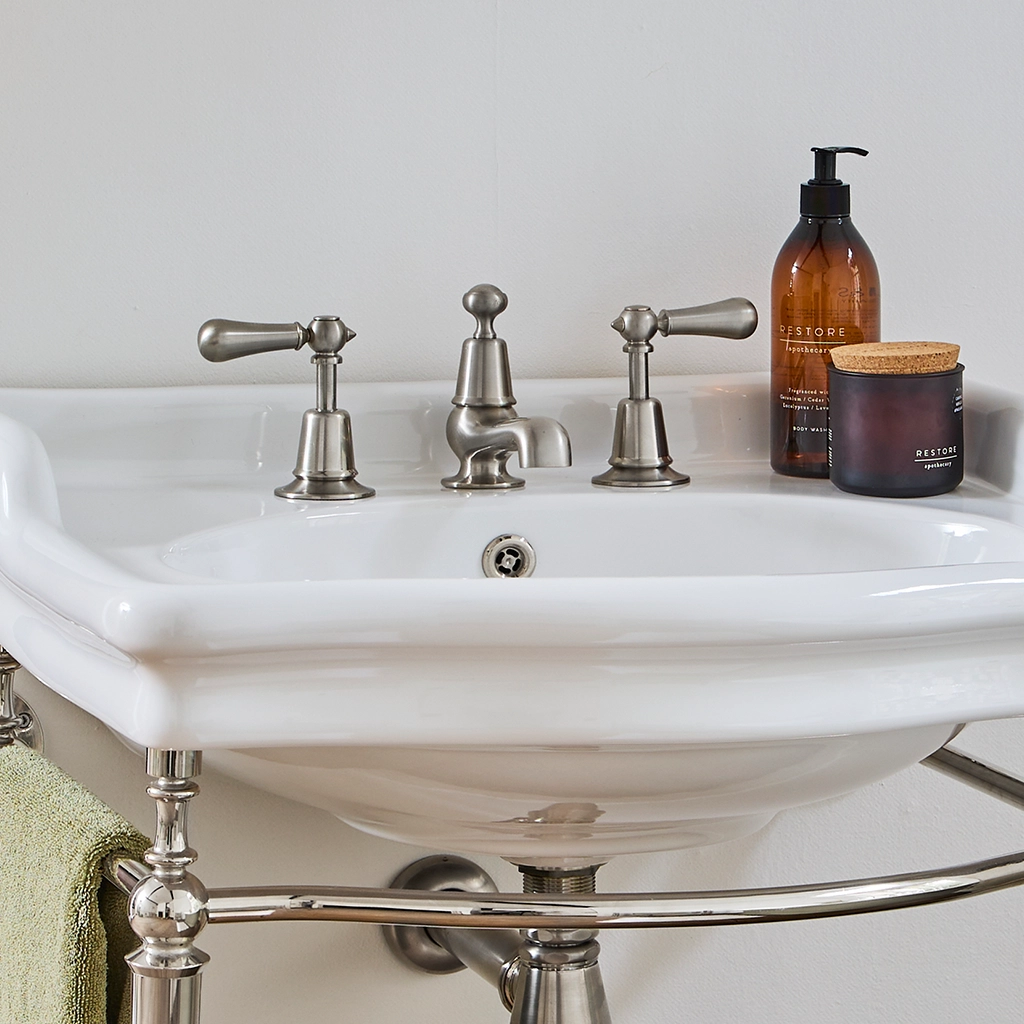 The Three Hole Basin Mixer is available in two bathroom mixer tap designs, the wall-mounted option and the standard deck-mounted version.