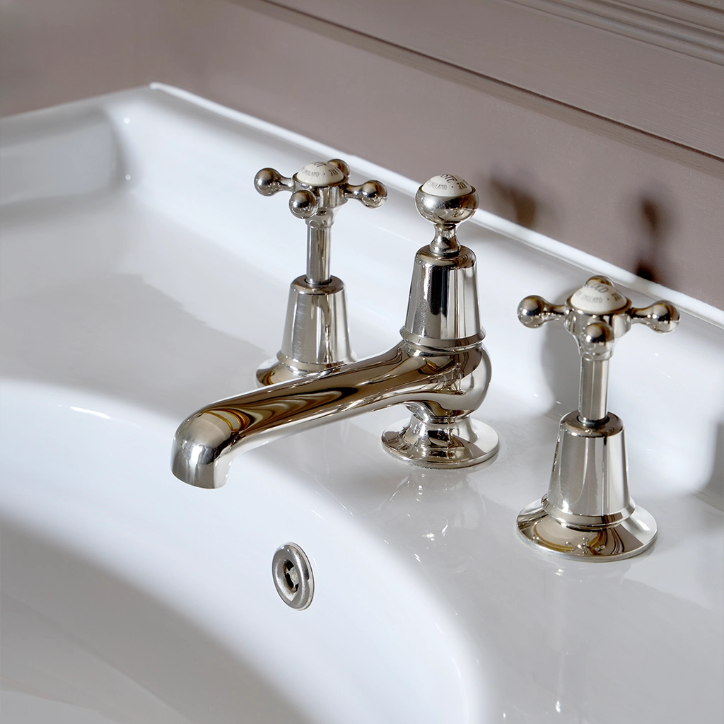 The Three Hole Basin Mixer is available in two bathroom mixer tap designs, the wall-mounted option and the standard deck-mounted version.