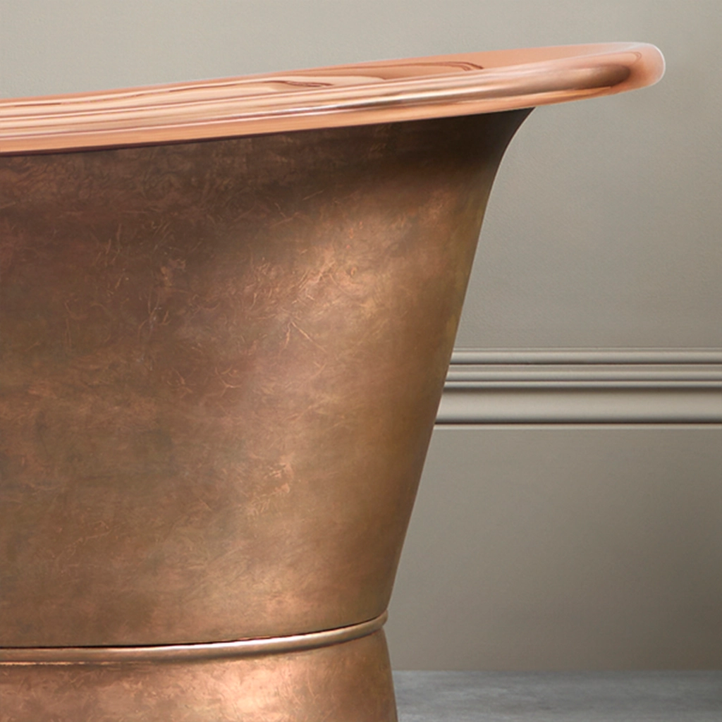 Freestanding Weathered Traditional Copper Bath with bath filler on standpipes