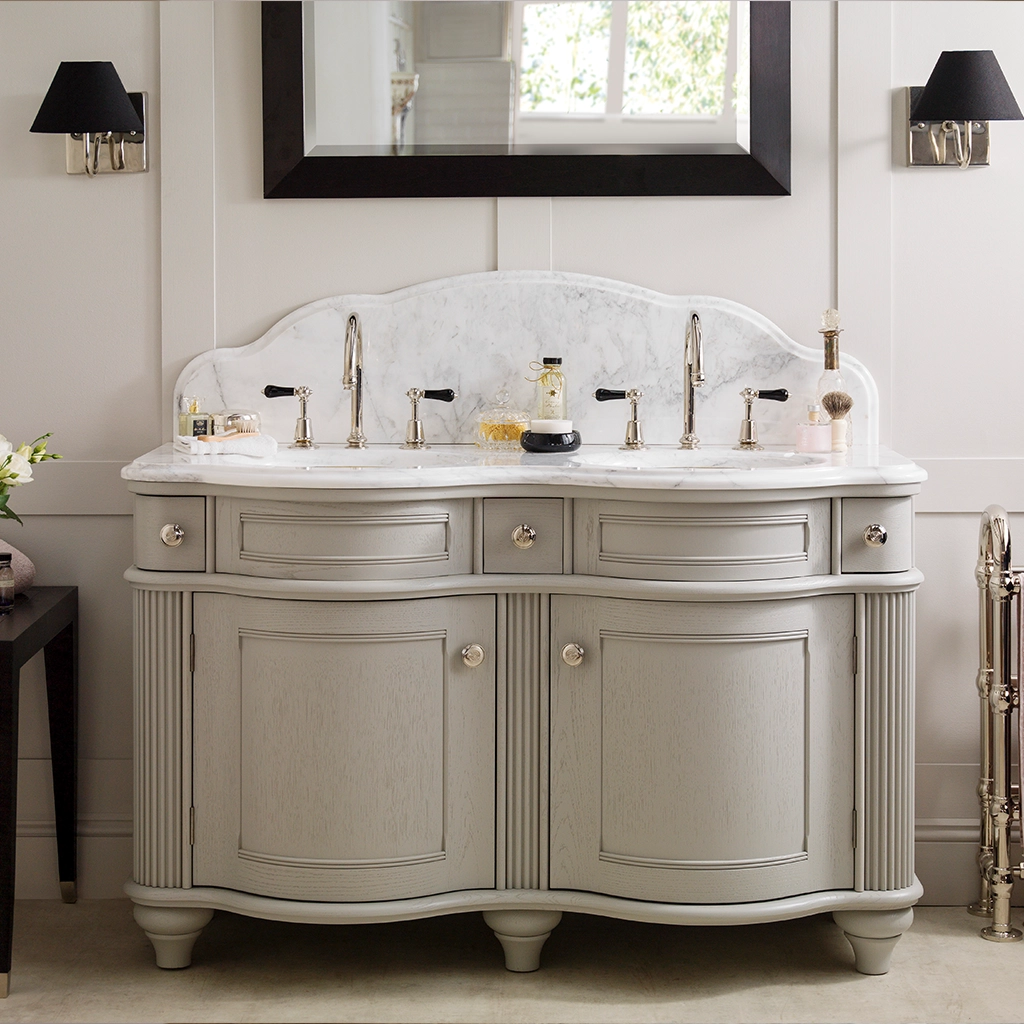 Double wooden vanity unit with amble bathroom storage and marble splashback