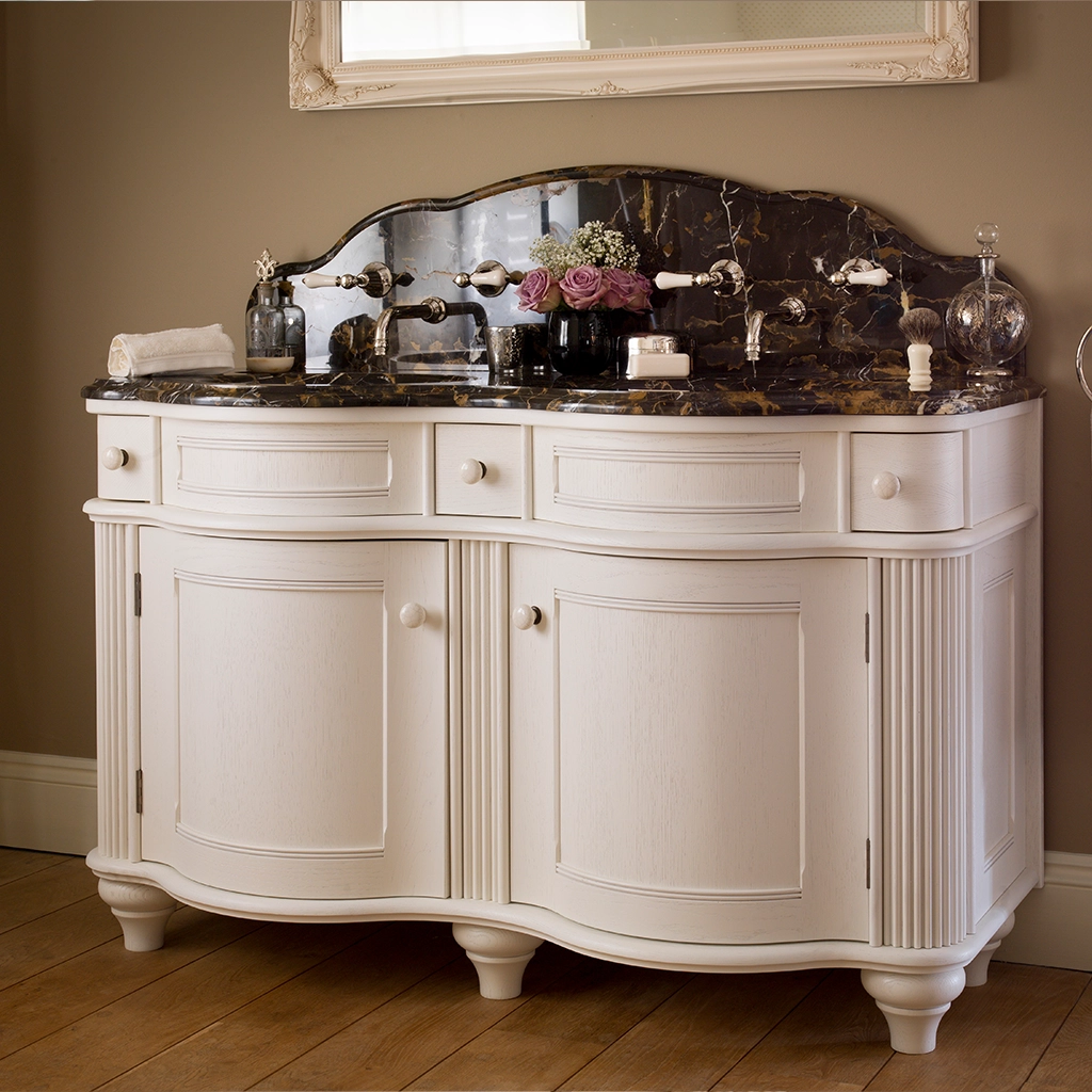 Double wooden vanity unit with amble bathroom storage and marble splashback