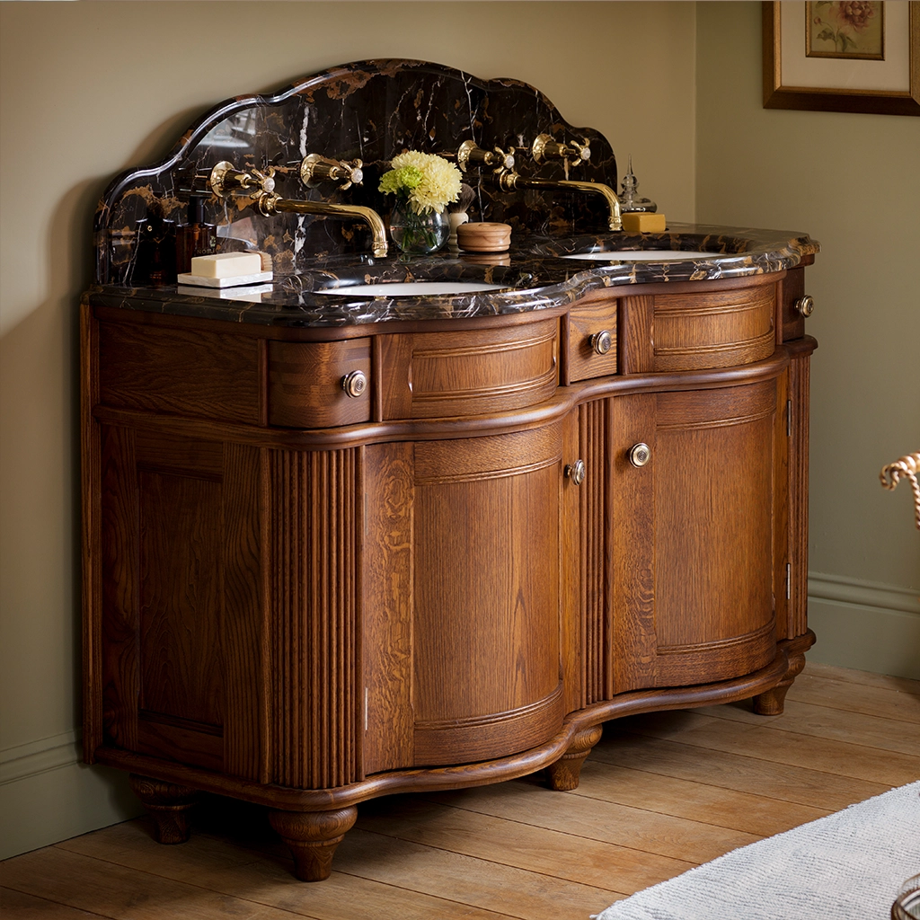 Double wooden vanity unit with amble bathroom storage and marble splashback