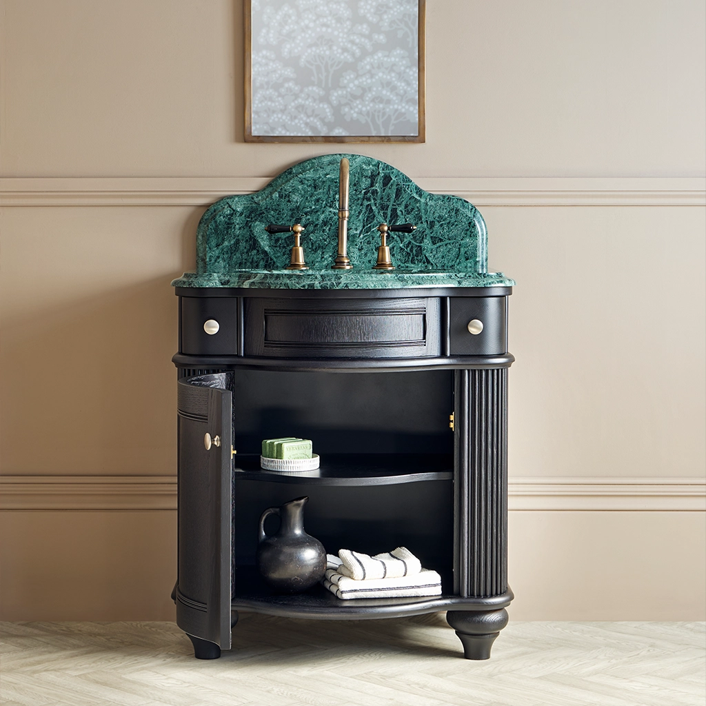 Single wooden vanity unit with amble bathroom storage and marble splashback