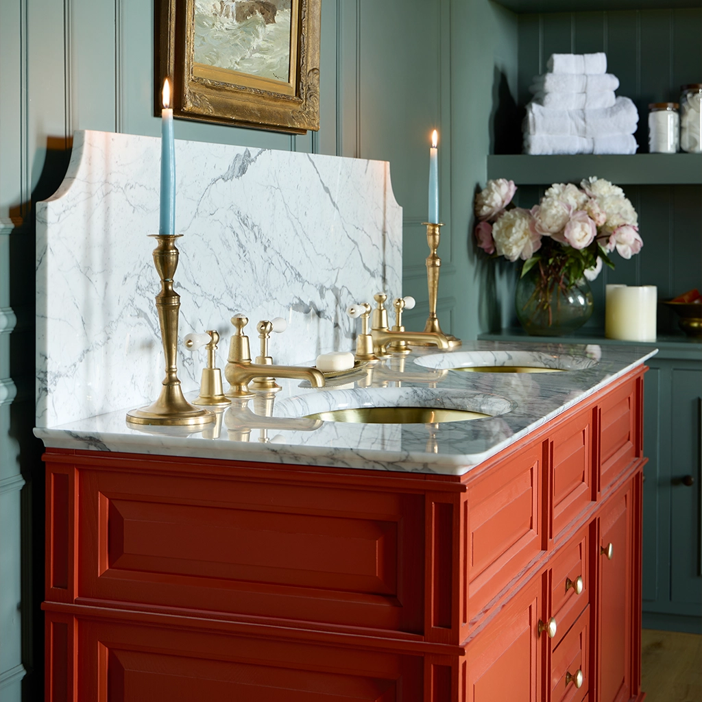 Double wooden vanity unit with amble bathroom storage and marble splashback