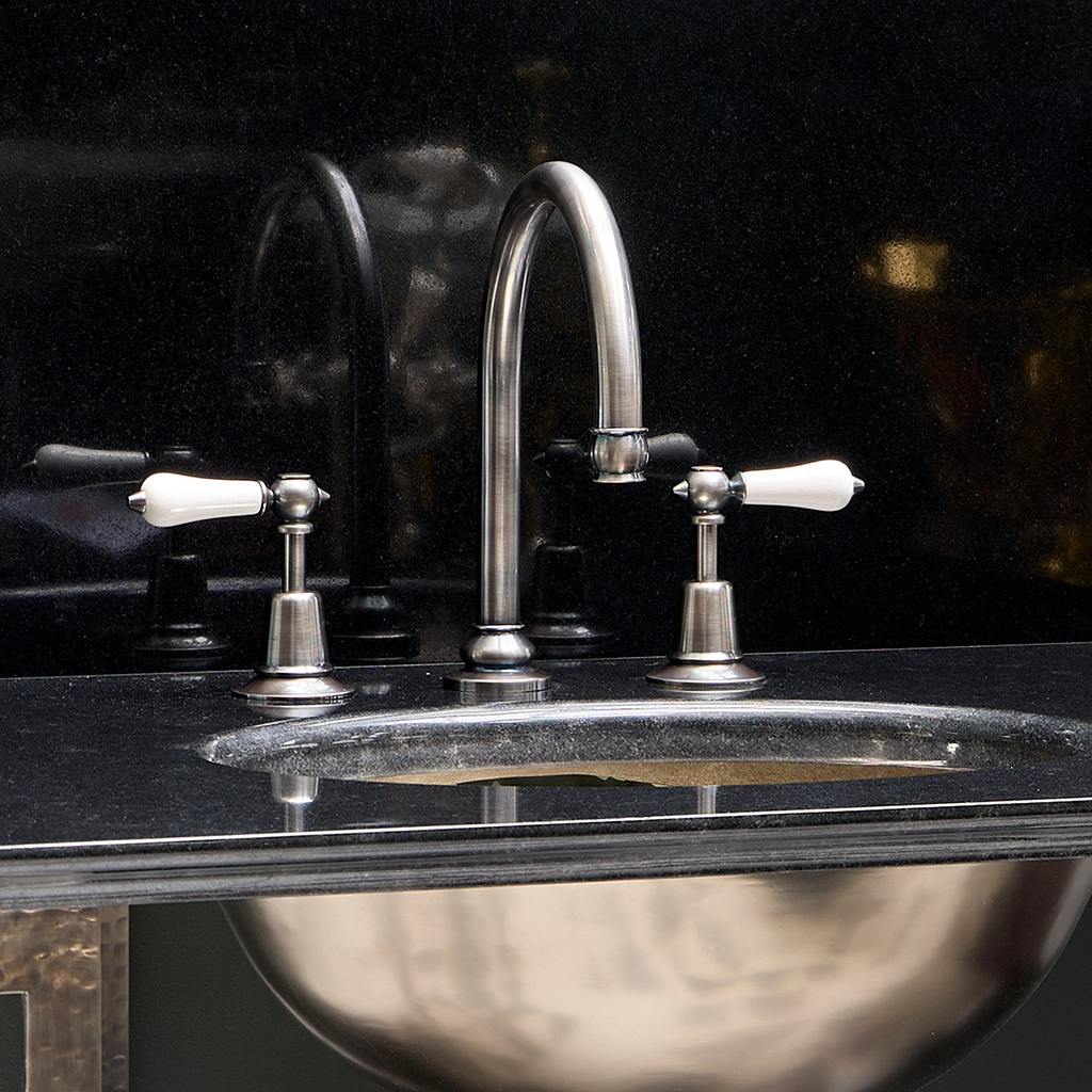 A basin mixer tap featuring our signature swan-neck spout made from solid brass with countless finish and tap-head options.