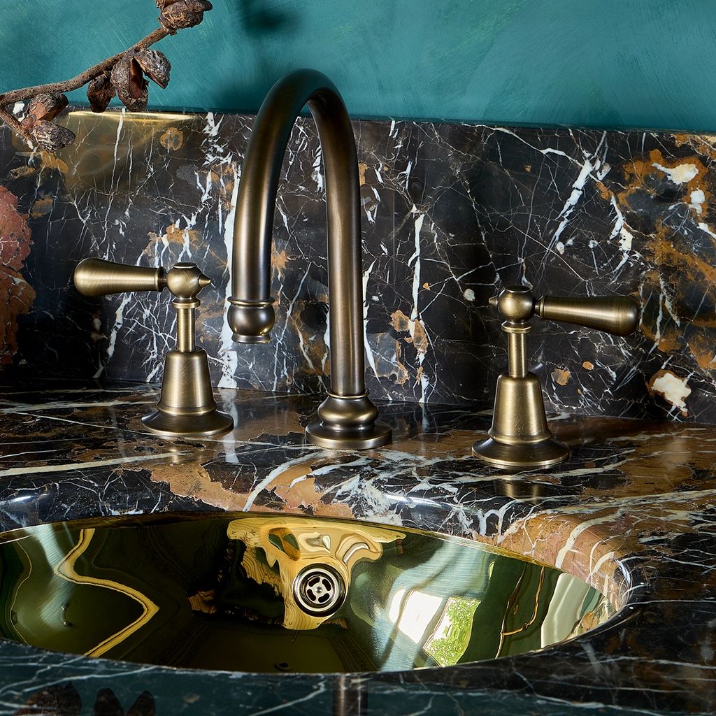 A basin mixer tap featuring our signature swan-neck spout made from solid brass with countless finish and tap-head options.