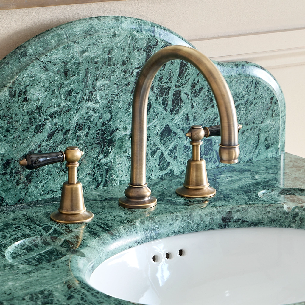A basin mixer tap featuring our signature swan-neck spout made from solid brass with countless finish and tap-head options.