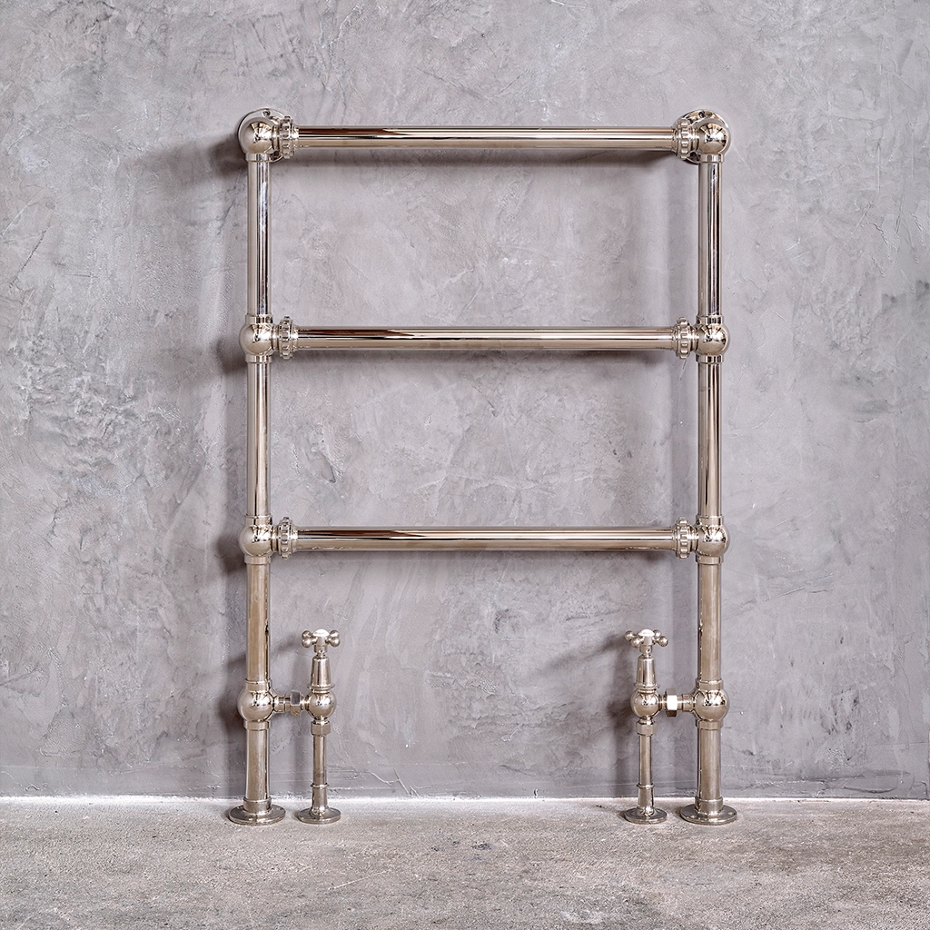 Magnificent in its stature, The Mercantile Three Bar is an exclusive brass heated towel rail with a short, ladder style frame and unique design elements.